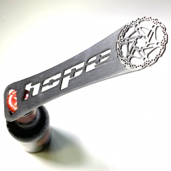 Hope Stainless Steel Bottle Opener - in use - opening bottle of beer